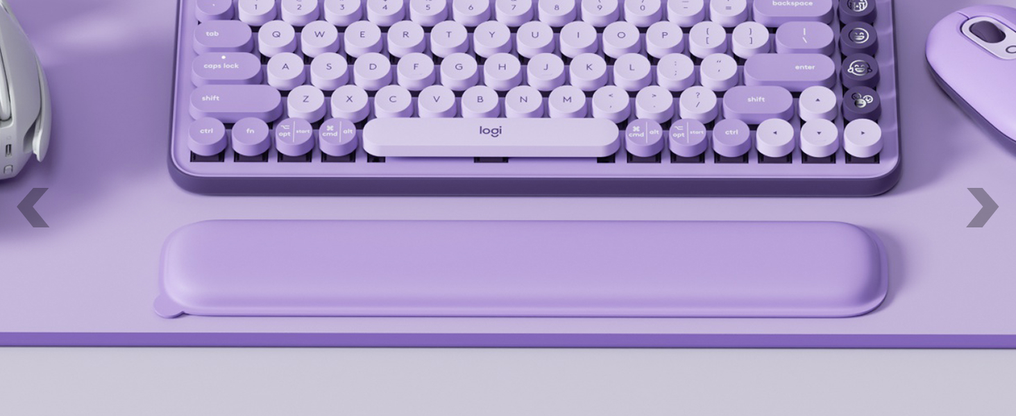 pop keys cosmos violet sitting on logitech desk mat extended lavender purple mouse pad