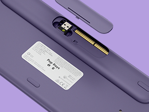 zoom on the storage for the logi bolt usb receiver of pop keys cosmos wireless purple keyboard