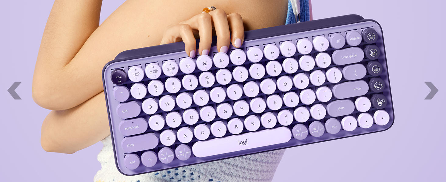 zoom of a woman holding in one hand pop keys cosmos wireless mechanical purple keyboard