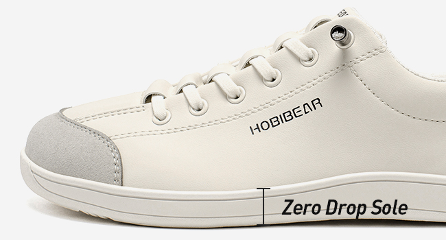 Text reads 'Zero Drop Sole', 'HOBIBEAR'. White minimalist sneaker shown from multiple angles, featuring low-top design with lace-up closure.